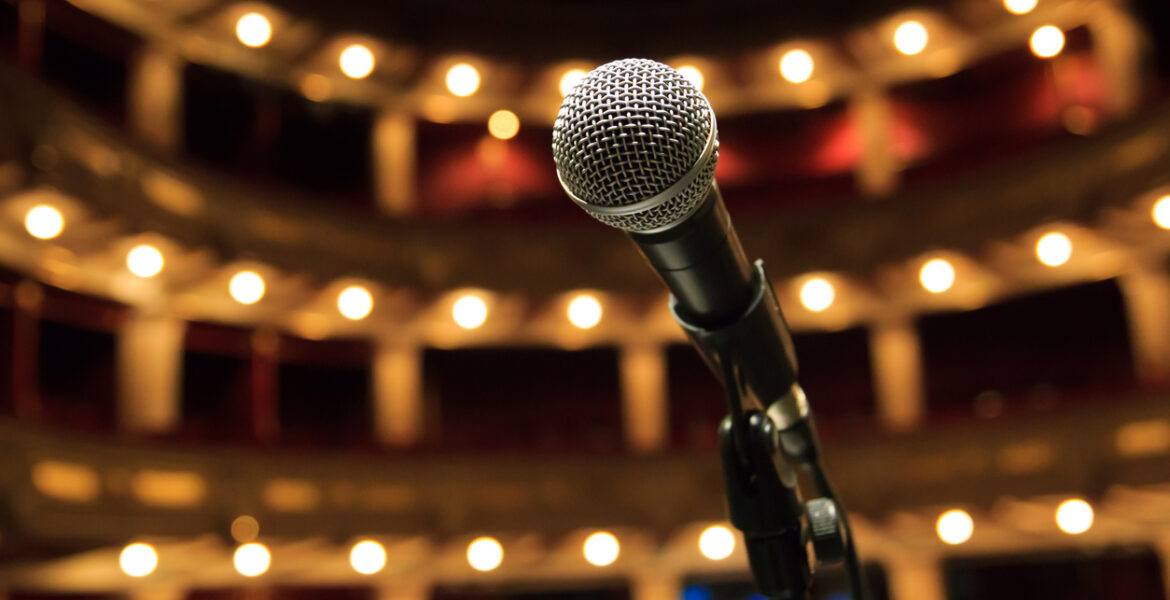 Close up of microphone in concert hall, theater